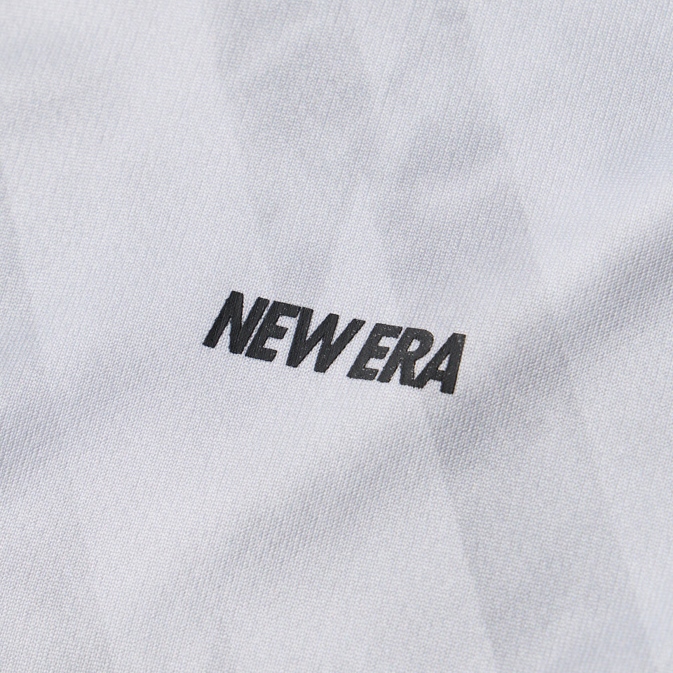 半袖 テックTシャツ タイダイ Allover Wordmark Logo ホワイト | パフォーマンスアパレル | NEW ERA ニューエラ公式オンラインストア