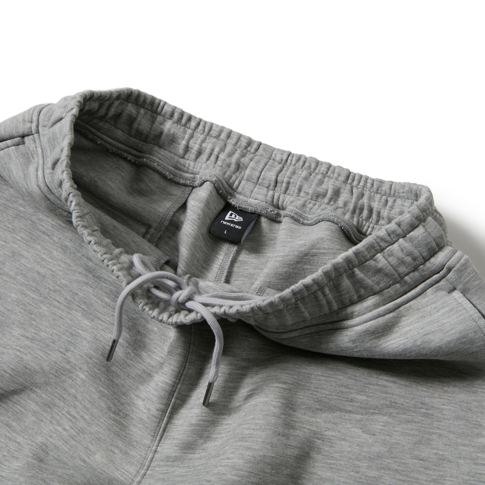バスケットボール オーバーサイズド テック スウェット パンツ Brand Name Logo グレー｜パフォーマンスアパレル | NEW ERA ニューエラ公式オンラインストア