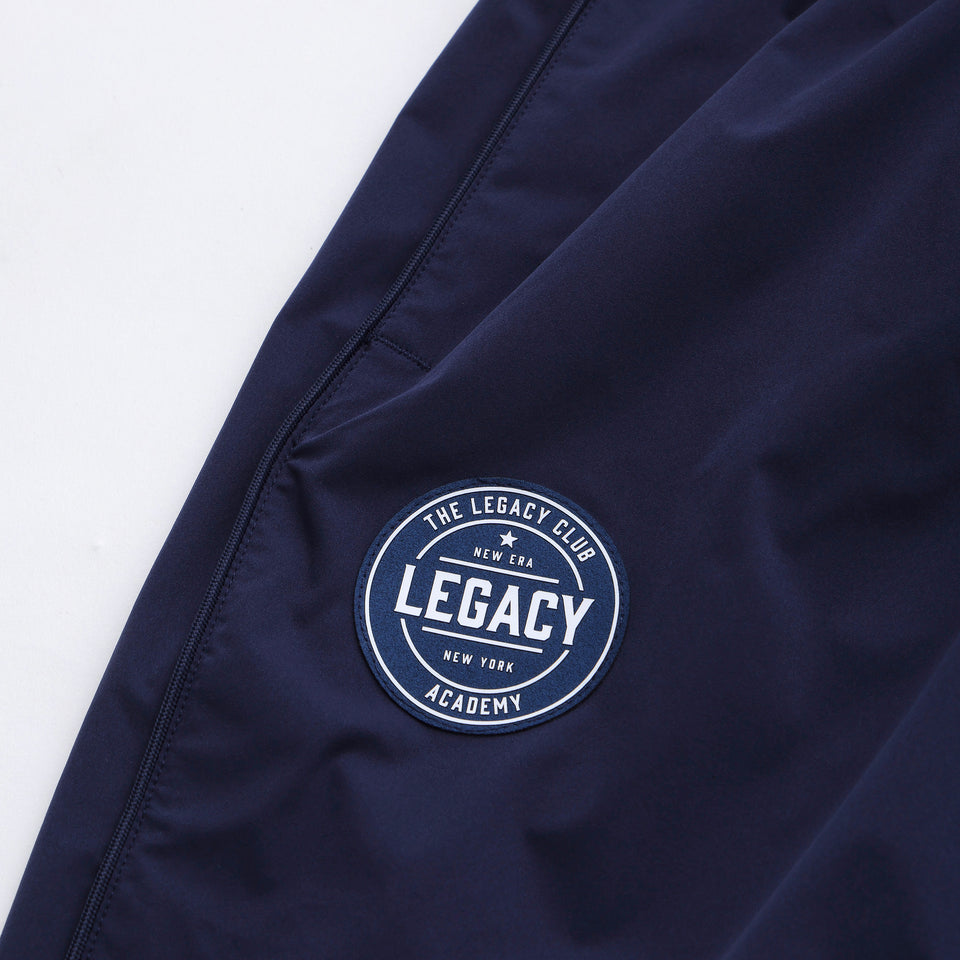 オーバーサイズド パイピング トラックパンツ LEGACY CLUB ACADEMY ネイビー/ブルー | パフォーマンスアパレル | NEW ERA ニューエラ公式オンラインストア