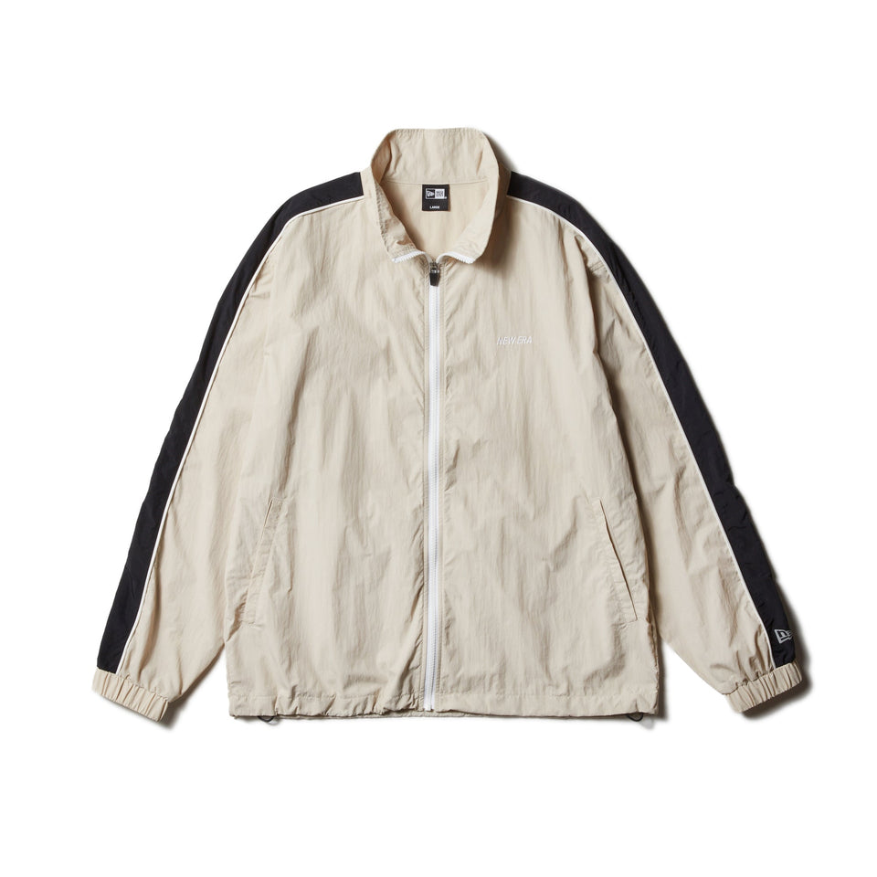 ナイロン サイドテープ トラックジャケット ストーン 【Performance Apparel】 - 14312819 - S | NEW ERA ニューエラ公式オンラインストア