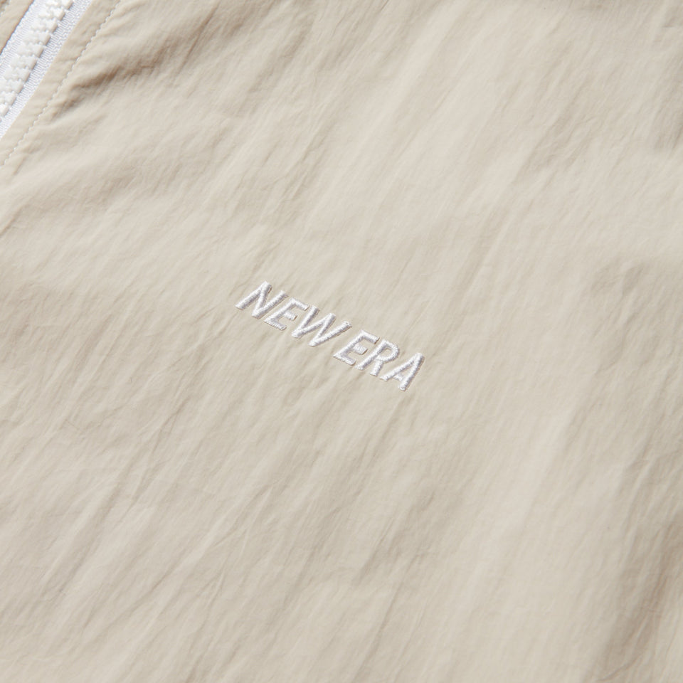 ナイロン サイドテープ トラックジャケット ストーン 【Performance Apparel】 - 14312819 - S | NEW ERA ニューエラ公式オンラインストア