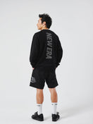 長袖 オーバーサイズド パフォーマンス Tシャツ Vertical Logo ブラック | パフォーマンスアパレル - 14674830 - S | NEW ERA ニューエラ公式オンラインストア