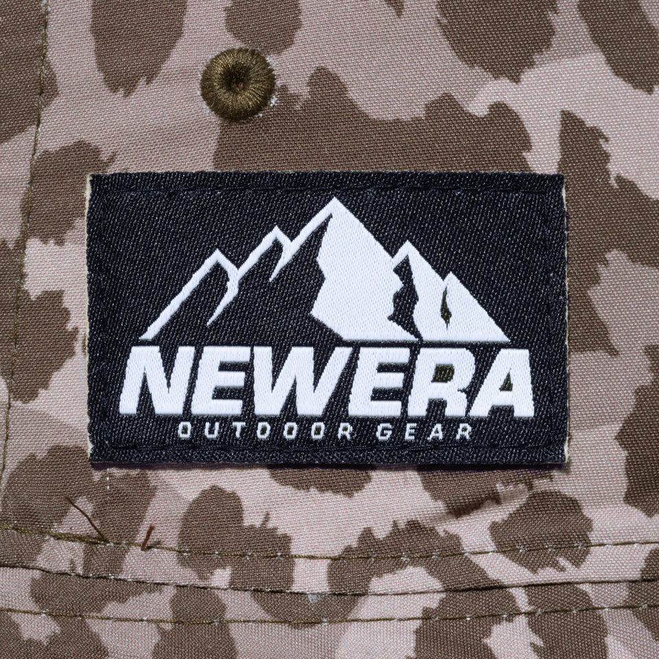 バケット01 リバーシブル Leopard Camo Mountain Logo Label バーントウッド/ブラウンレオパードカモ【ニューエラアウトドア】 - 13516195-SM | NEW ERA ニューエラ公式オンラインストア