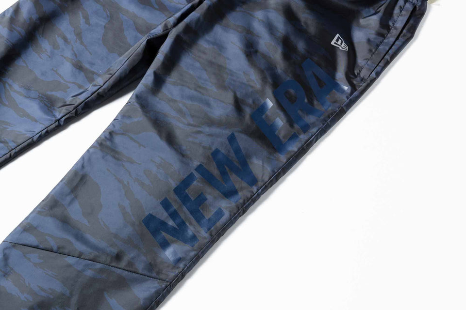 【 Performance Apparel 】 ウィンドパンツ タイガーストライプカモ × ネイビー - 11597590-S | NEW ERA ニューエラ公式オンラインストア